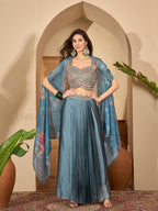 Women's Blue Solid & Embroidered Satin Draped Lehenga Choli With Shrug