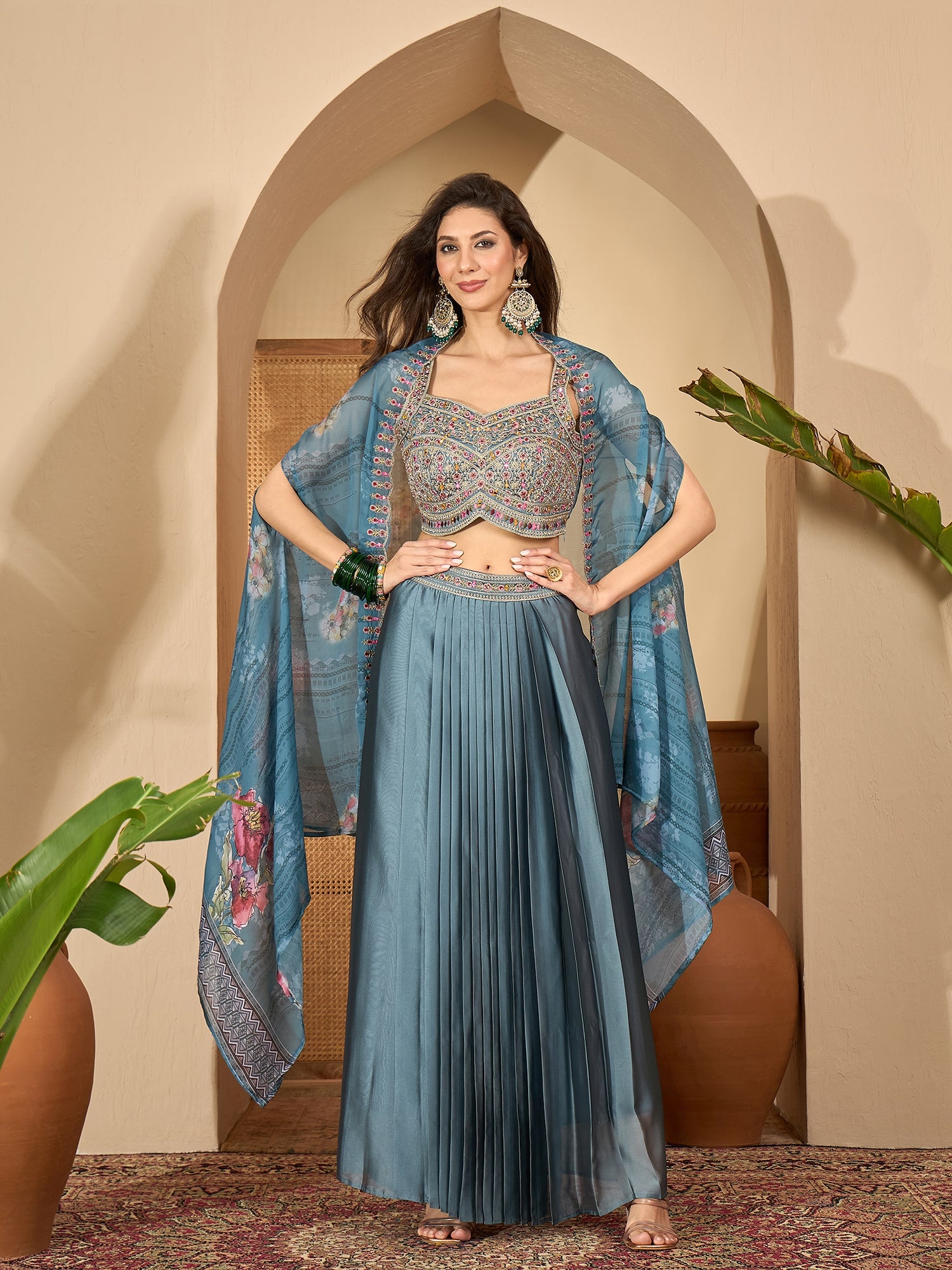 Women's Blue Solid & Embroidered Satin Draped Lehenga Choli With Shrug
