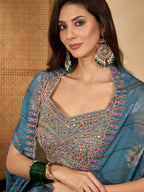 Women's Blue Solid & Embroidered Satin Draped Lehenga Choli With Shrug