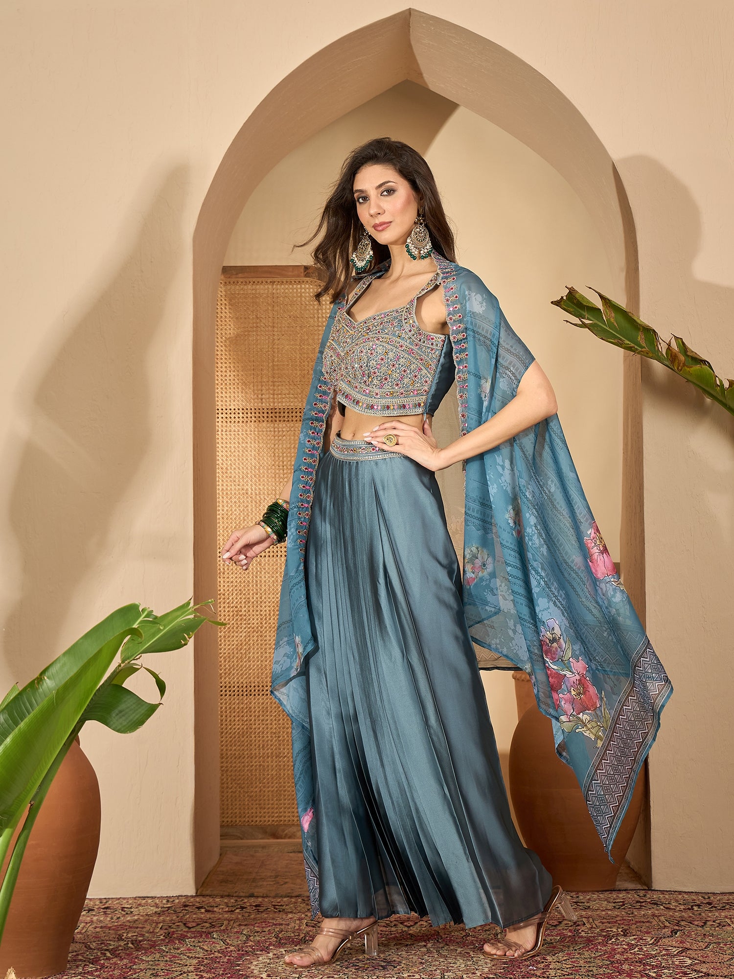 Women's Blue Solid & Embroidered Satin Draped Lehenga Choli With Shrug