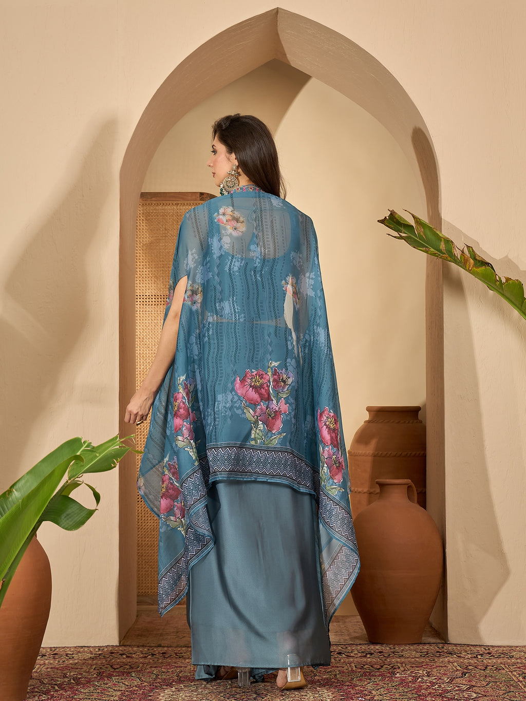 Women's Blue Solid & Embroidered Satin Draped Lehenga Choli With Shrug