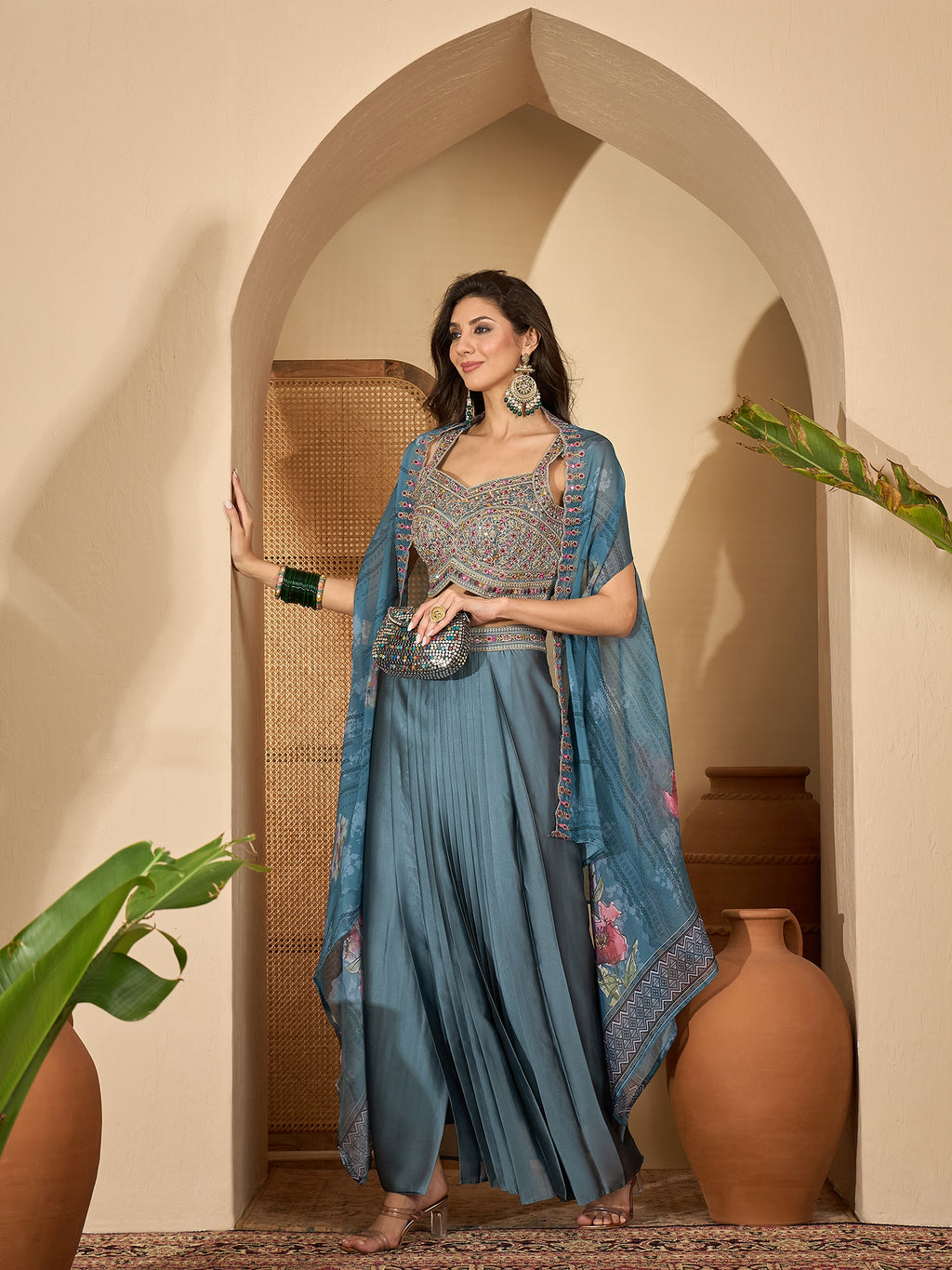 Women's Blue Solid & Embroidered Satin Draped Lehenga Choli With Shrug